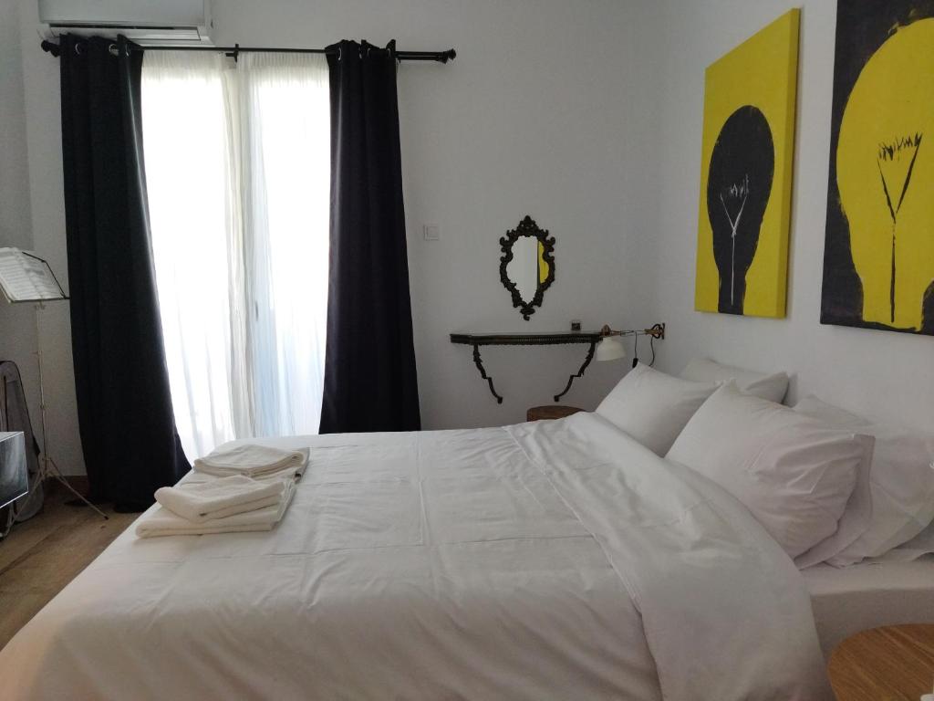 Postel nebo postele na pokoji v ubytování Minimal apartment by the beach