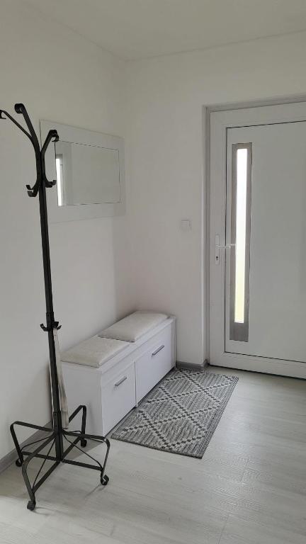 Postel nebo postele na pokoji v ubytování Apartman s bazénem a saunou