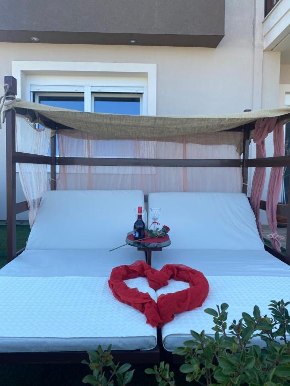 Postel nebo postele na pokoji v ubytování Chalkida Hilltop Apartments