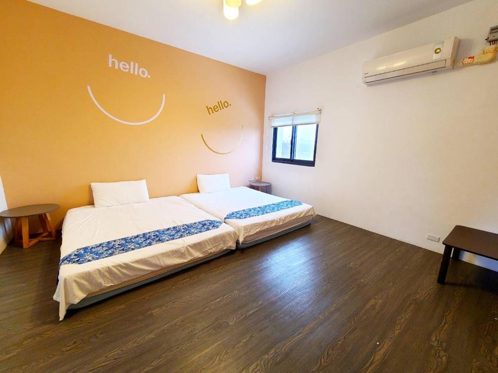 Postel nebo postele na pokoji v ubytování New Summer Homestay