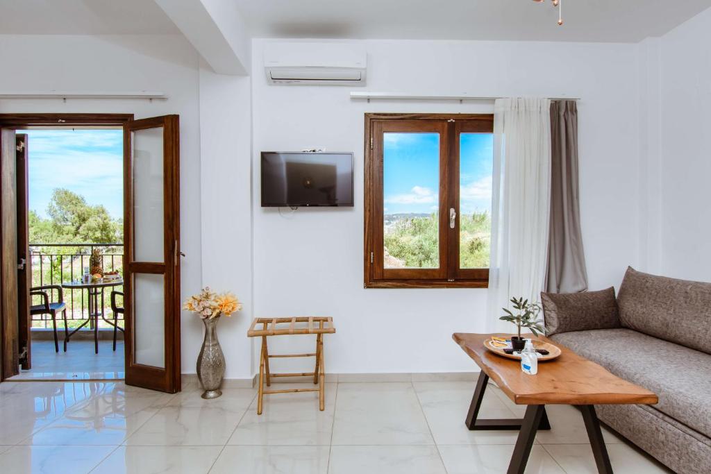 TV a/nebo společenská místnost v ubytování Deluxe Suites