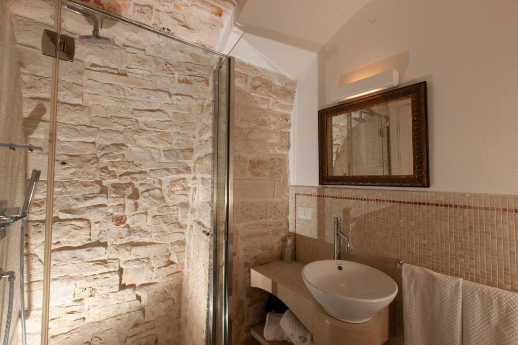 Koupelna v ubytování Le Alcove - Luxury Hotel nei Trulli