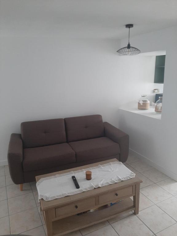 Posezení v ubytování Au petit chai de Dolus