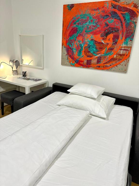 Postel nebo postele na pokoji v ubytování Apartments Mango Downtown