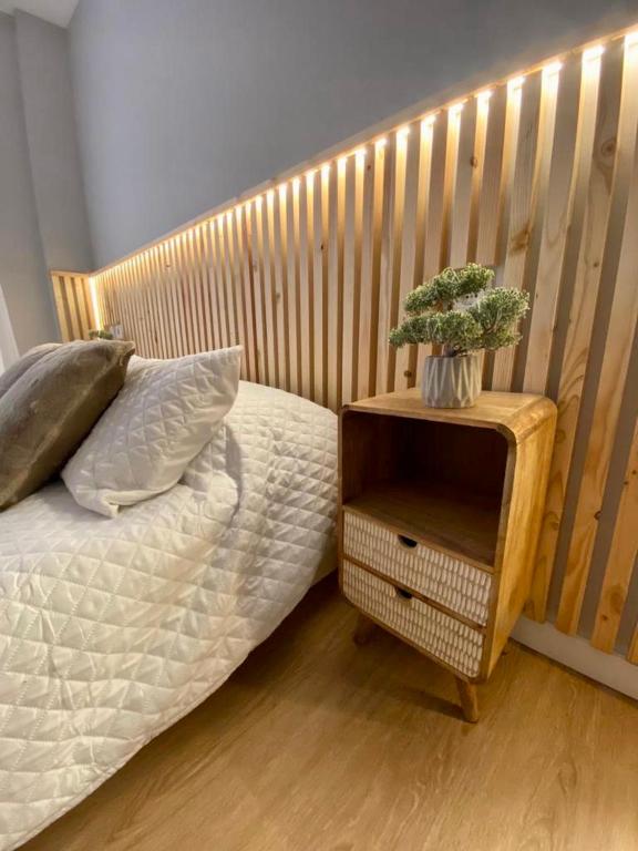 Łóżko lub łóżka w pokoju w obiekcie Amazon Malaga