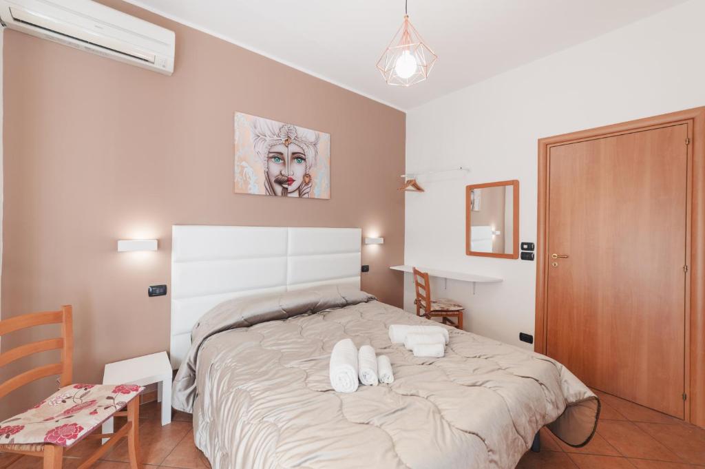 Uma cama ou camas num quarto em Fontana Vecchia