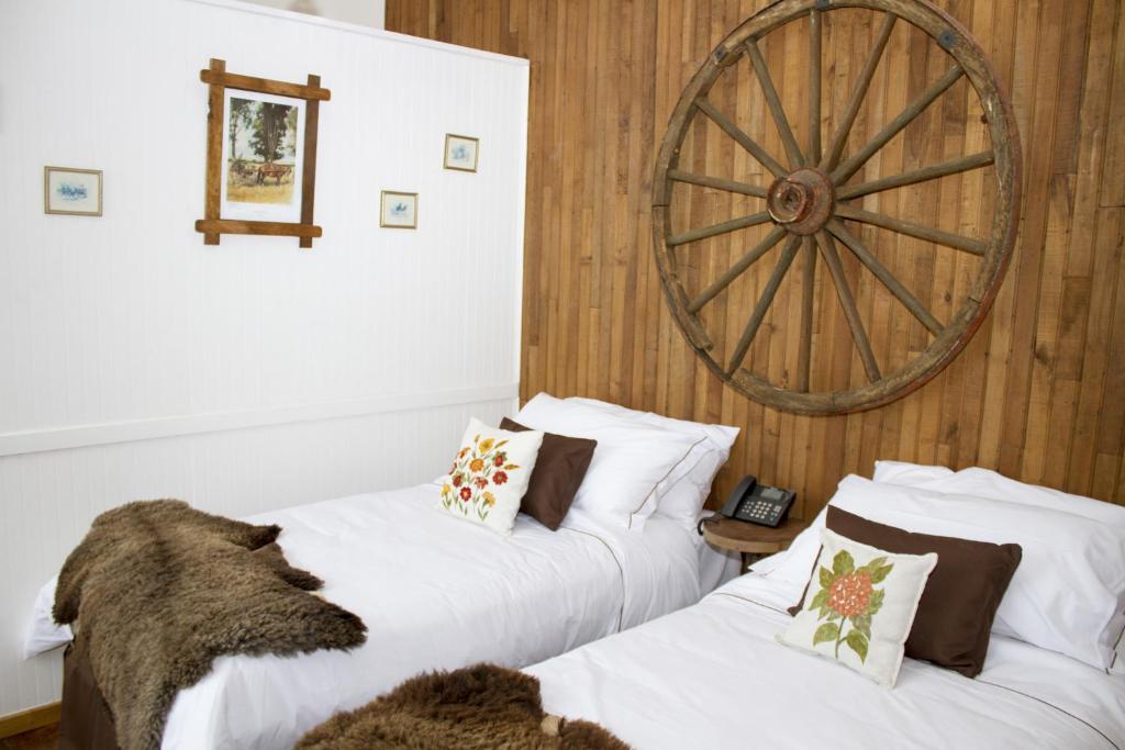 Postel nebo postele na pokoji v ubytování Hotel Boutique La Yegua Loca