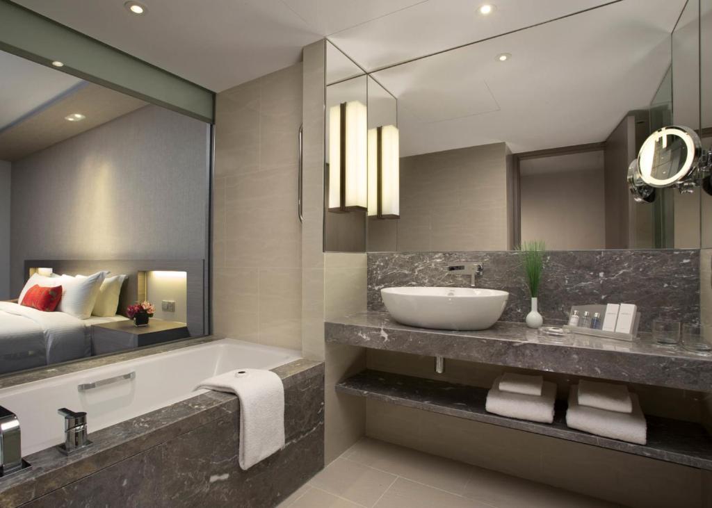 Cama o camas de una habitación en Carlton Hotel Singapore