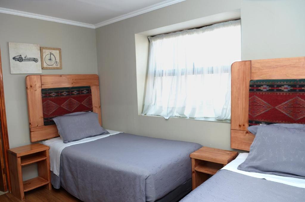 Postel nebo postele na pokoji v ubytování 914 Hotel