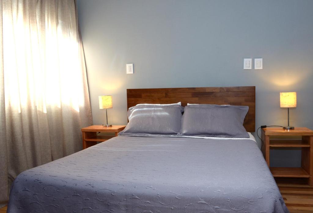 Postel nebo postele na pokoji v ubytování 914 Hotel