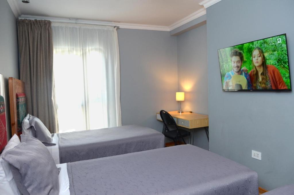 Postel nebo postele na pokoji v ubytování 914 Hotel