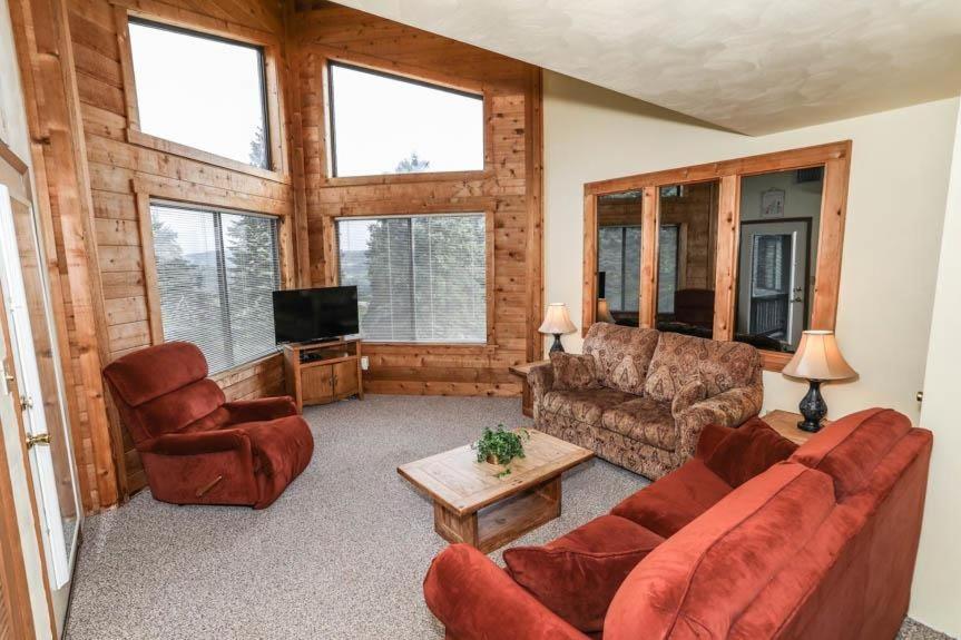 a living room with a couch and chairs and a television at Seven Springs Stoneridge 1 Bedroom Loft Standard Condo, Pet Friendly! condo in Champion