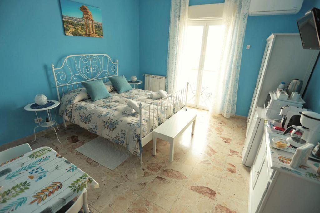 Postel nebo postele na pokoji v ubytování B&B MiraValle Agrigento
