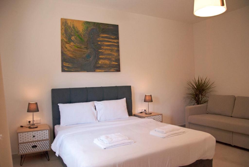 Posteľ alebo postele v izbe v ubytovaní Angelbay Bungalows