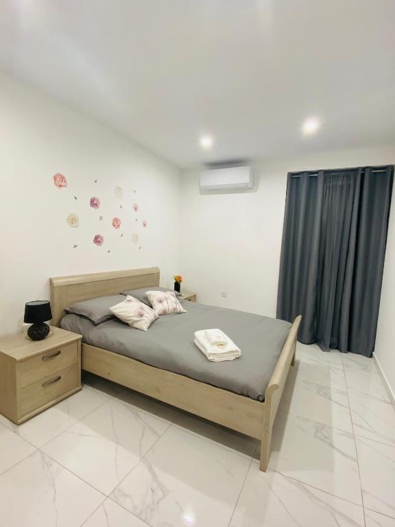 Postel nebo postele na pokoji v ubytování Central, Bright & Modern Apartment