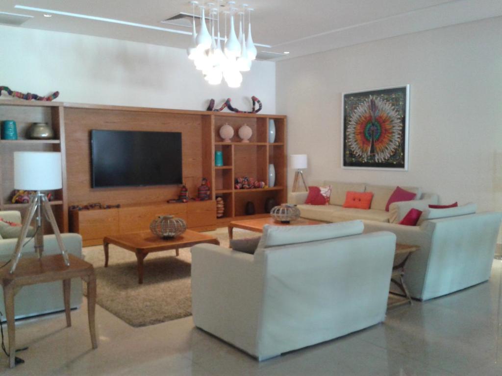 TV a/nebo společenská místnost v ubytování Jatiúca Resort Flat 404