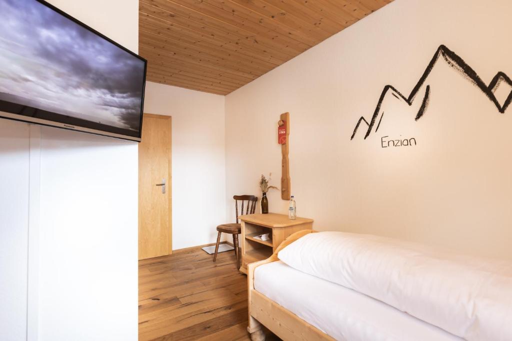 TV a/nebo společenská místnost v ubytování Landgasthof Augustiner