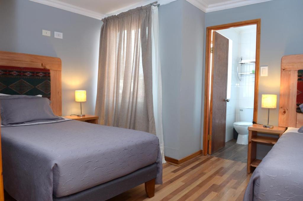 Postel nebo postele na pokoji v ubytování 914 Hotel