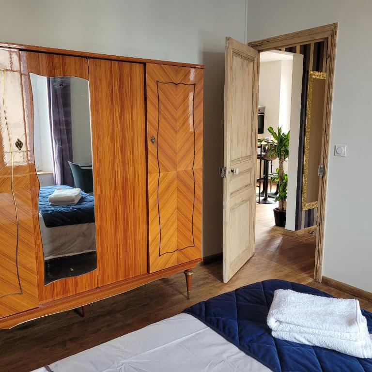 Postel nebo postele na pokoji v ubytování Appartements CDG JOIGNY