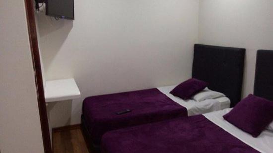 Postel nebo postele na pokoji v ubytování Hotel Casa Morada 63
