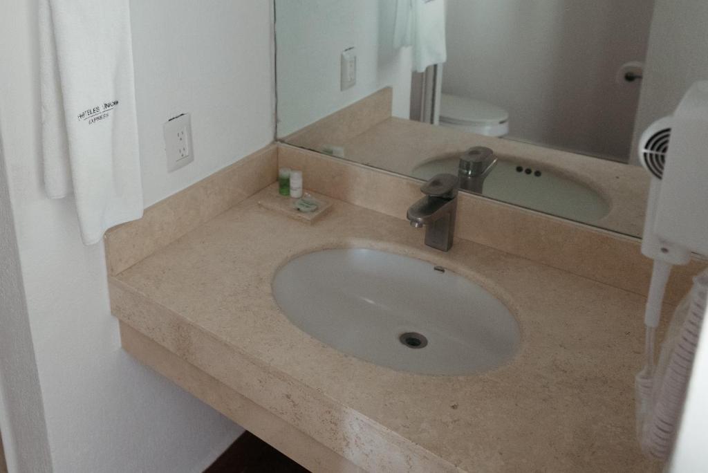 Koupelna v ubytování Hoteles Unico Express
