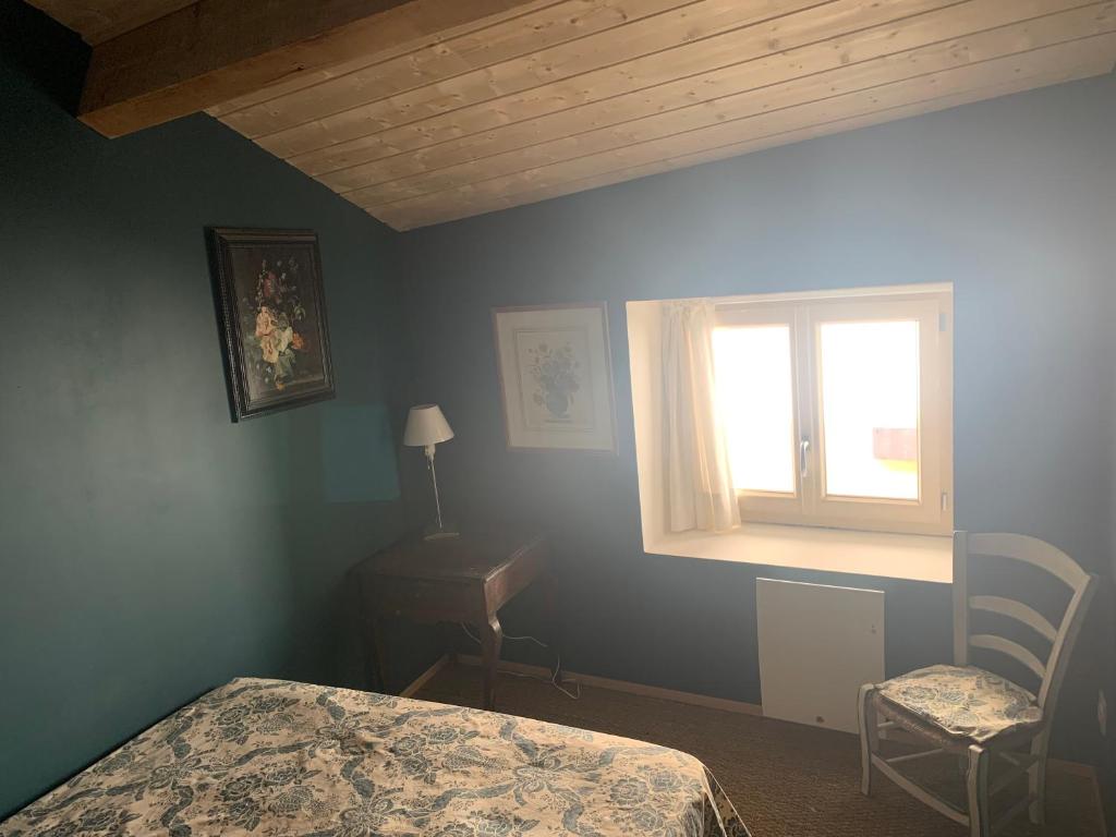 Postel nebo postele na pokoji v ubytování paradis blanc
