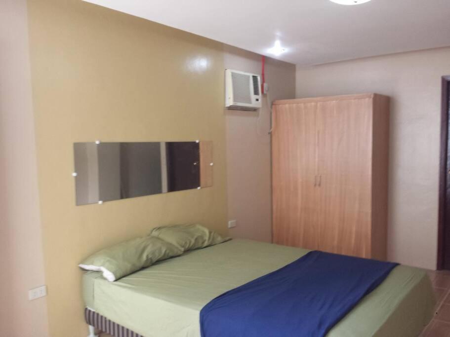 Postel nebo postele na pokoji v ubytování JW Apartments