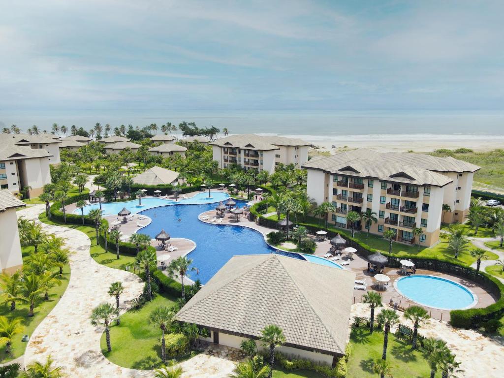 an aerial view of a resort with a pool at VG Sun Cumbuco Sea Breeze Vista Mar in Cumbuco