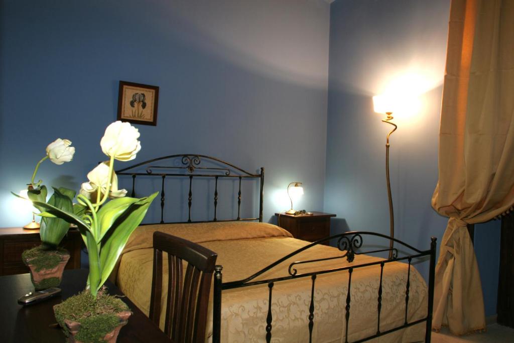 Postel nebo postele na pokoji v ubytování Sorella Luna