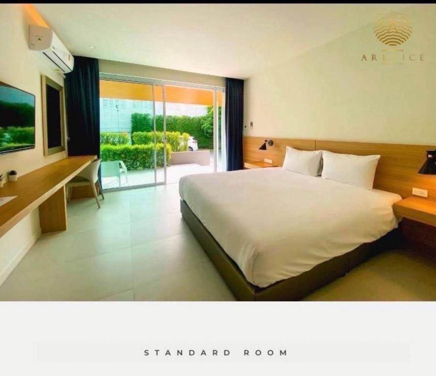ARENICE Boutique Hotel客房内的一张或多张床位