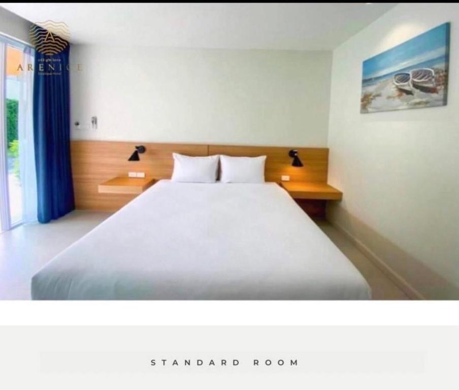 ARENICE Boutique Hotel客房内的一张或多张床位