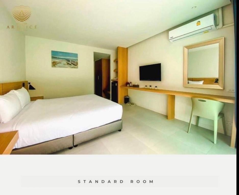 ARENICE Boutique Hotel客房内的一张或多张床位