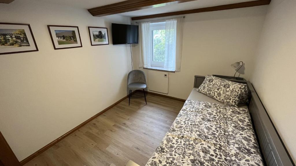 Postel nebo postele na pokoji v ubytování Zur alten Eiche