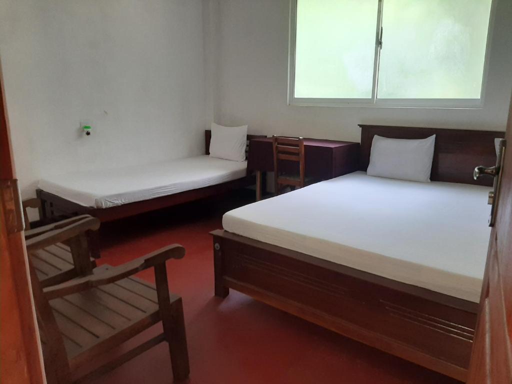 Postel nebo postele na pokoji v ubytování Hotel Yelona