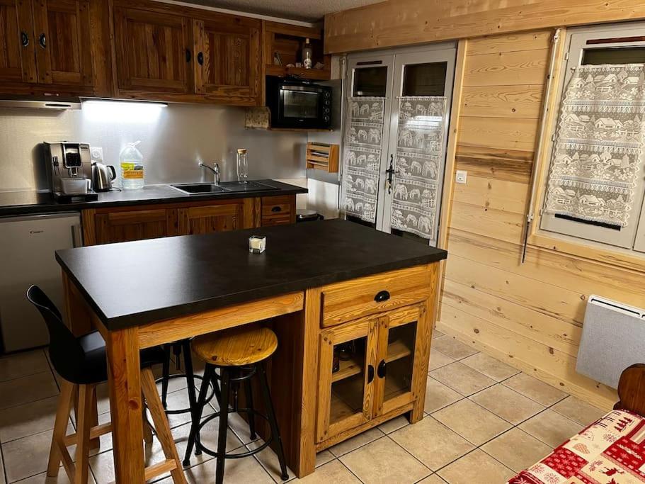 Kuchyňa alebo kuchynka v ubytovaní Appartement au pied des pistes