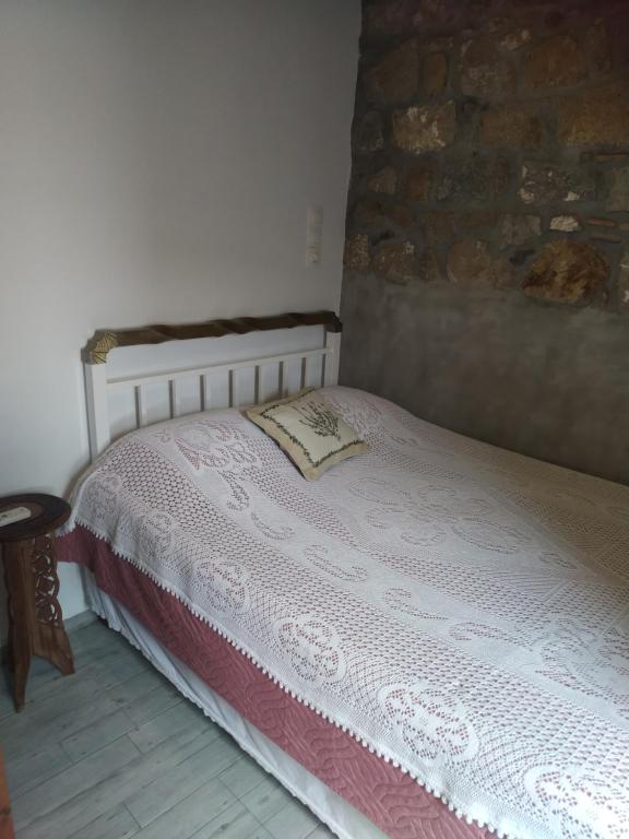 Postel nebo postele na pokoji v ubytování Manos House in Chora