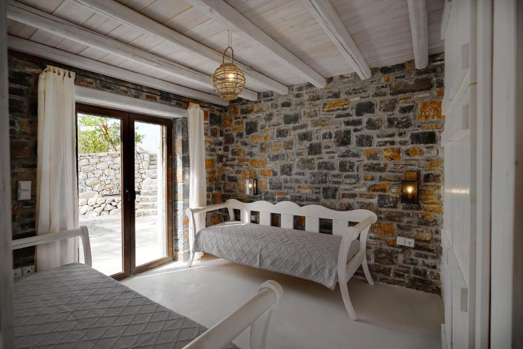 Postel nebo postele na pokoji v ubytování Palazzo Greco Villas