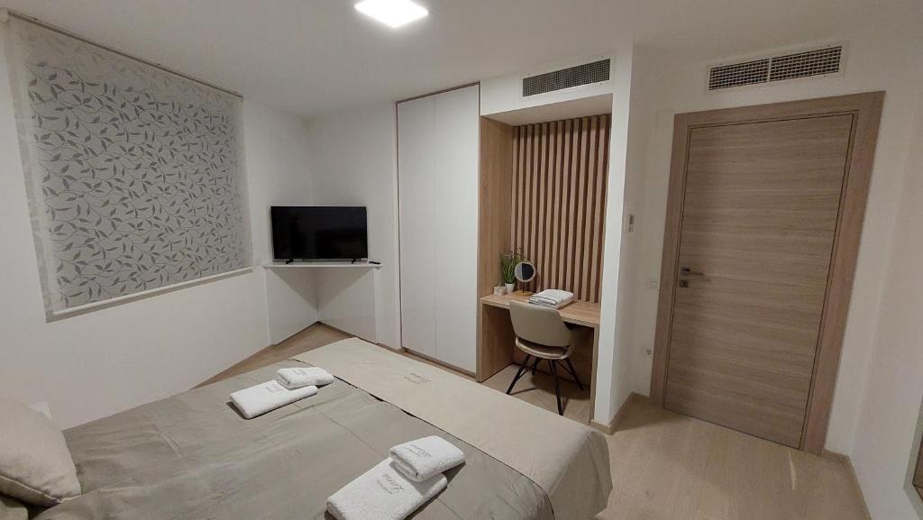 Telewizja i/lub zestaw kina domowego w obiekcie Apartment Leona, Opatija