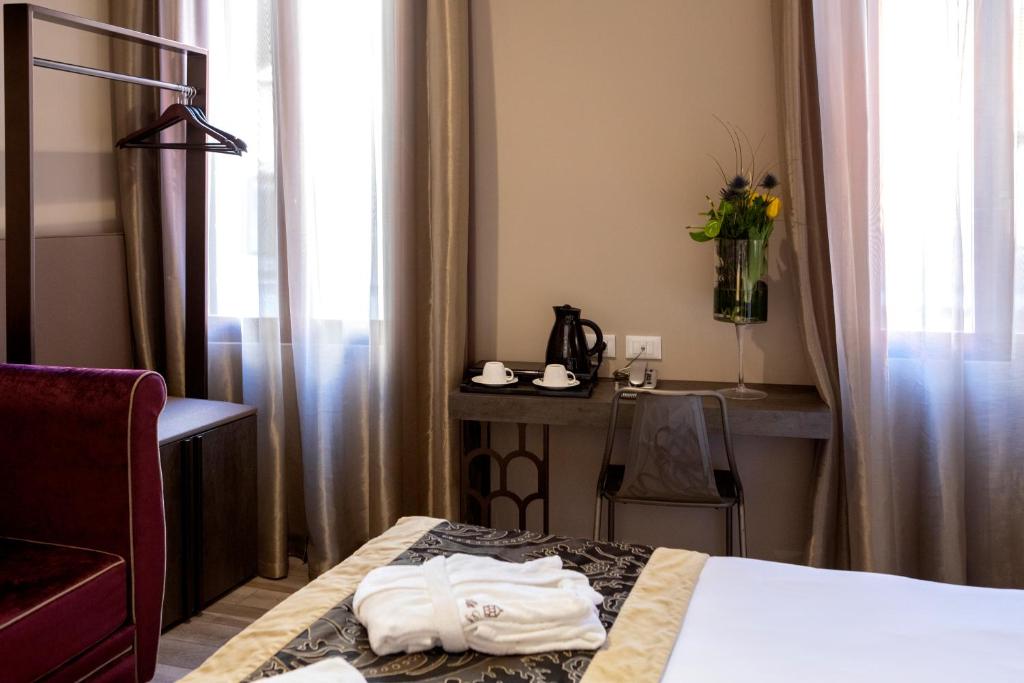 Letto o letti in una camera di Alle Guglie Boutique Hotel