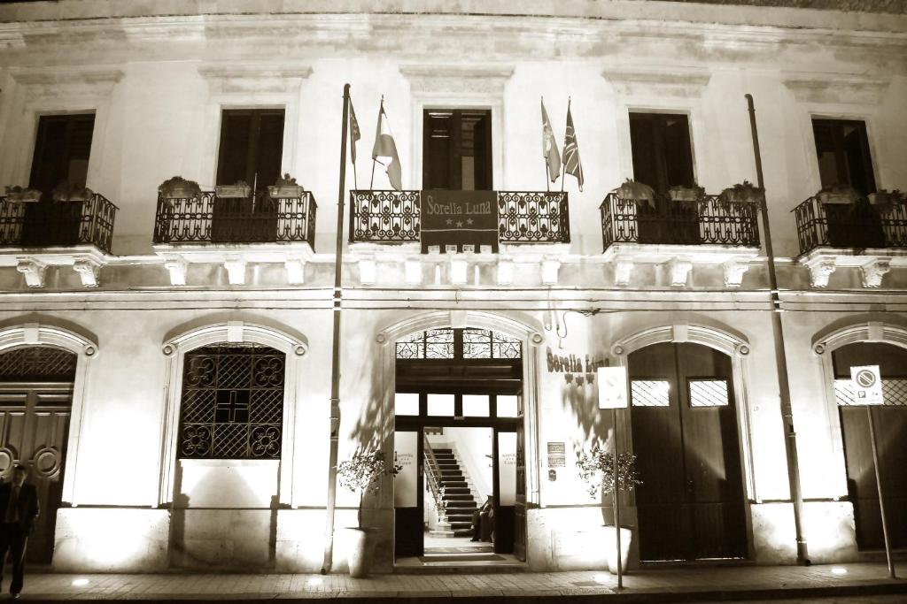 a black and white photo of a building at Sorella Luna in Siracusa