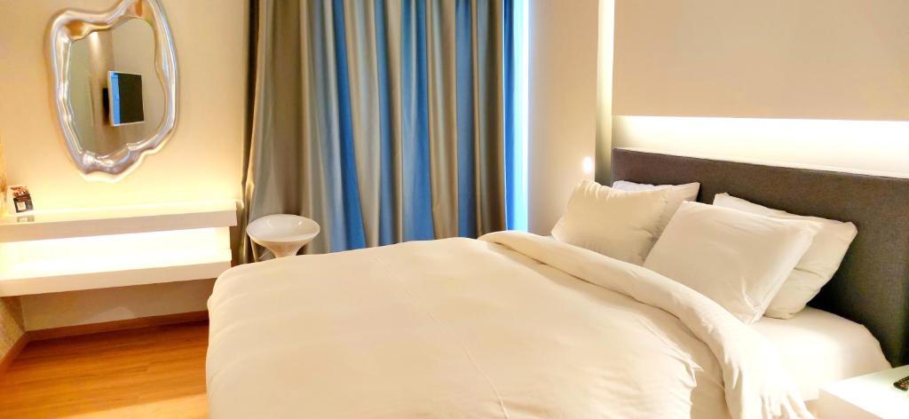 Posteľ alebo postele v izbe v ubytovaní Mirada Hotel