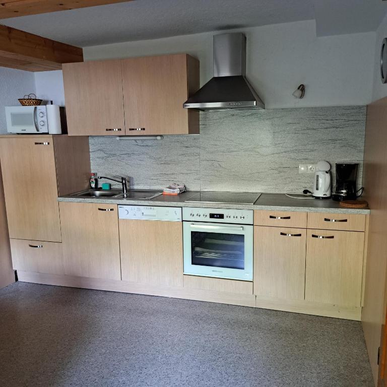 Kuchyň nebo kuchyňský kout v ubytování Haus Bacher