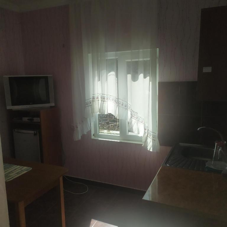 Kuchyň nebo kuchyňský kout v ubytování BARBIMARIA