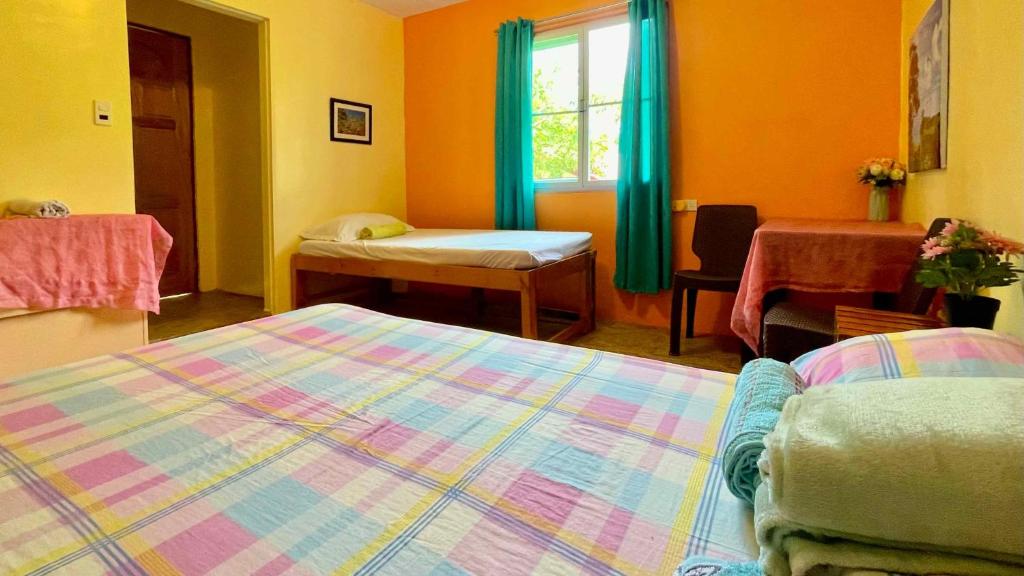 Postel nebo postele na pokoji v ubytování Blue Moon Guesthouse