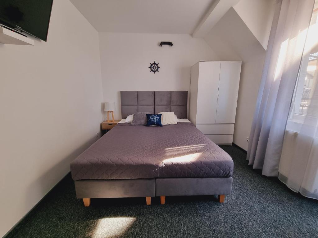 Postel nebo postele na pokoji v ubytování Willa ALBATROSA 9