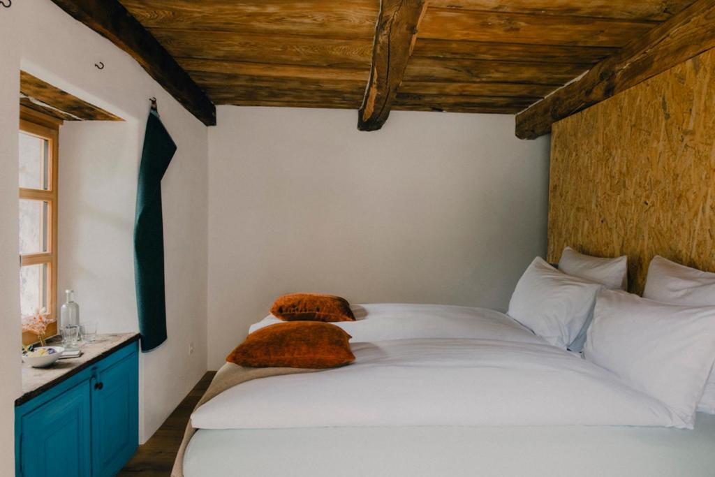 En eller flere senger på et rom på Corippo Albergo Diffuso
