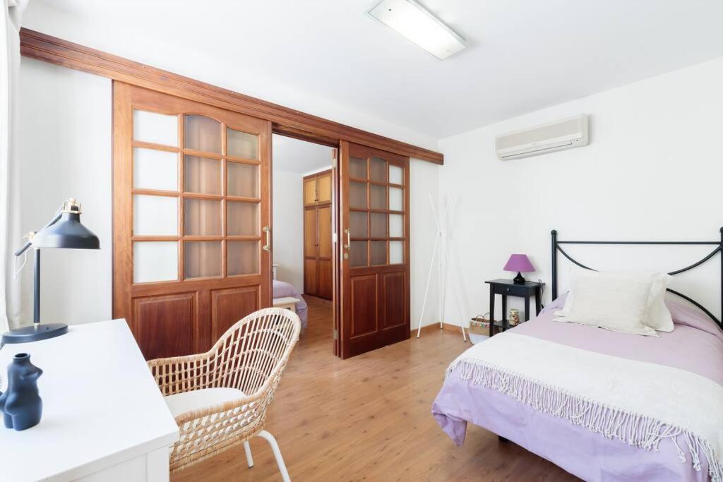 Postel nebo postele na pokoji v ubytování VV Casa Odaly