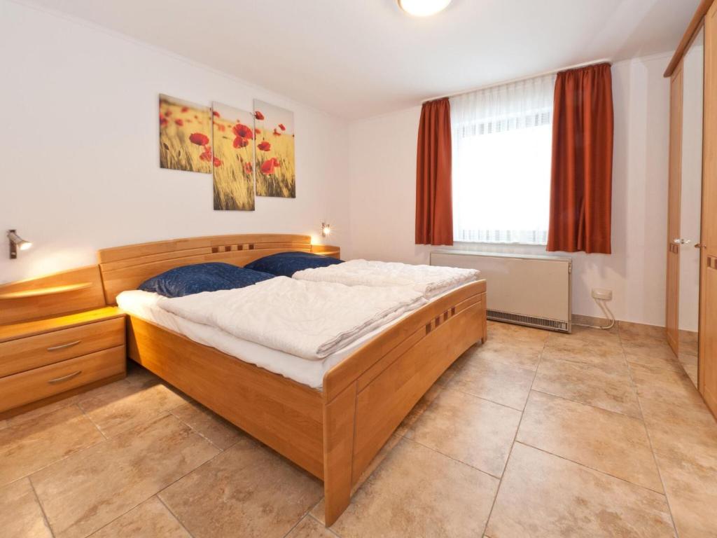 מיטה או מיטות בחדר ב-Urbane Holiday Home in Nesselwang-Reichenbach near Lake
