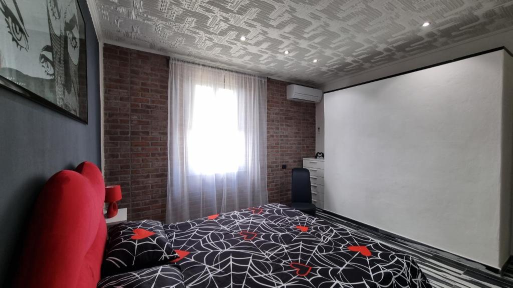 Postel nebo postele na pokoji v ubytování Diaboliko Apartment