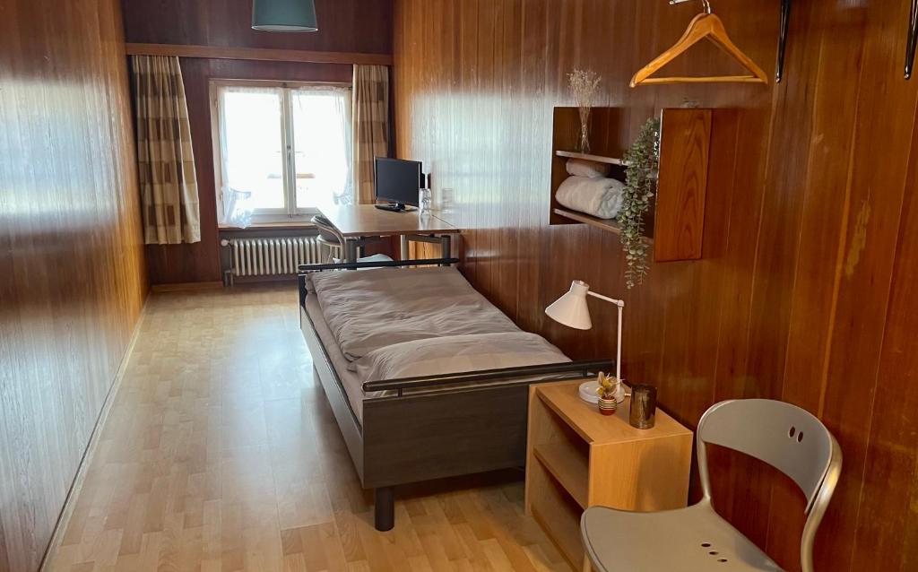 Postel nebo postele na pokoji v ubytování Hotel Jäger